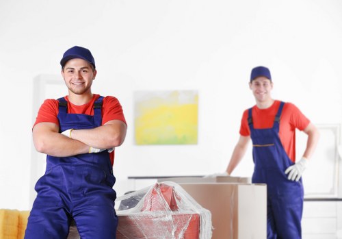Professional movers assisting in an office relocation in Ealing
