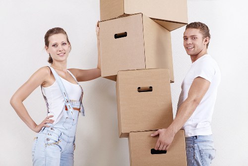Experienced man with van loading items